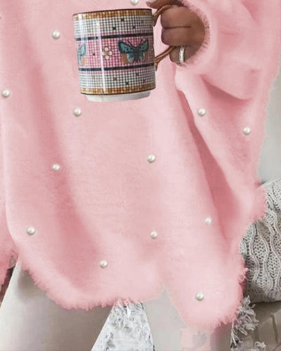 Lockerer Pullover mit V-Ausschnitt, langen Ärmeln und Perlen, verziert mit Applikationen 