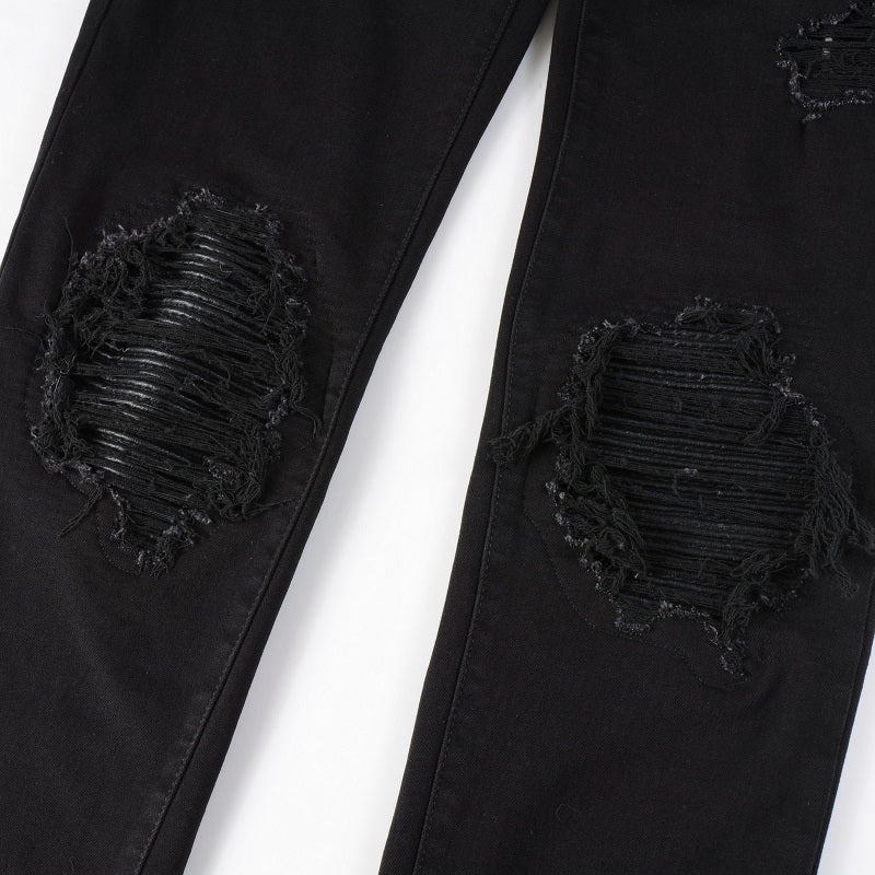 Jean à empiècements en cuir noir