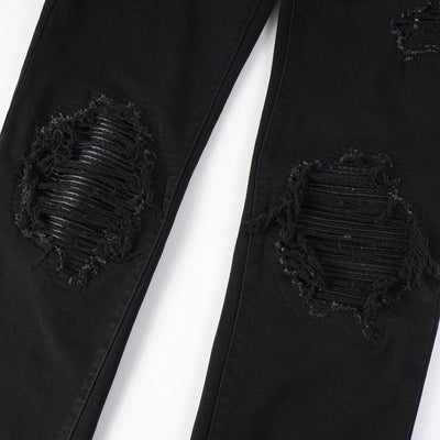 Jean à empiècements en cuir noir