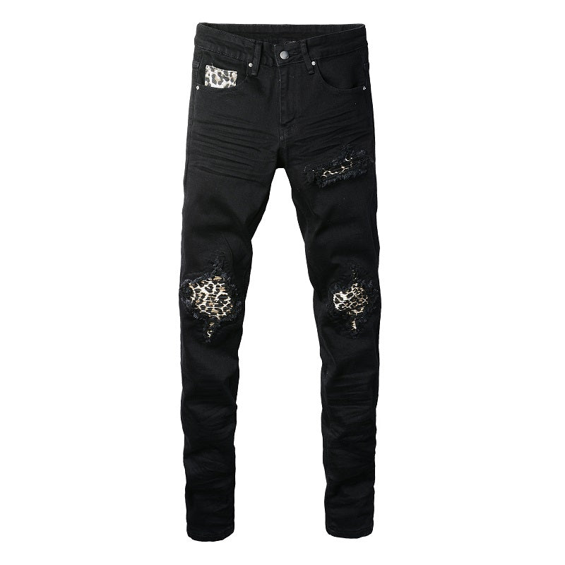 Schwarze Distressed Jeans mit Leoparden Patch Details