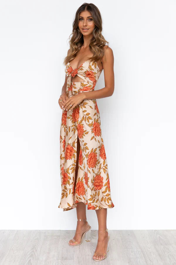 Esther | Trendiges Kleid mit Blumenmuster und Schlitz