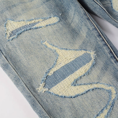Tear Patch Jeans
