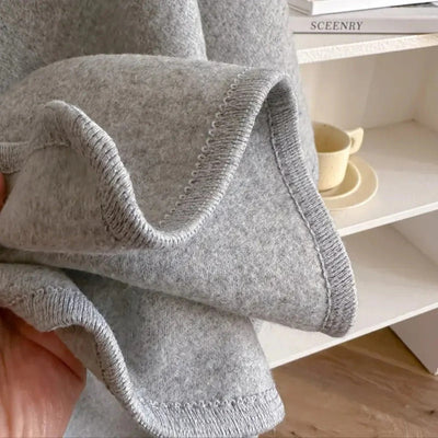 Emily | Eleganter Strickponcho mit Bindegürtel