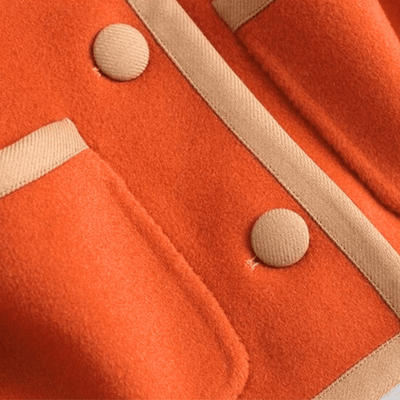 Chic Strickjacke mit Kontrastbesatz und Knöpfen